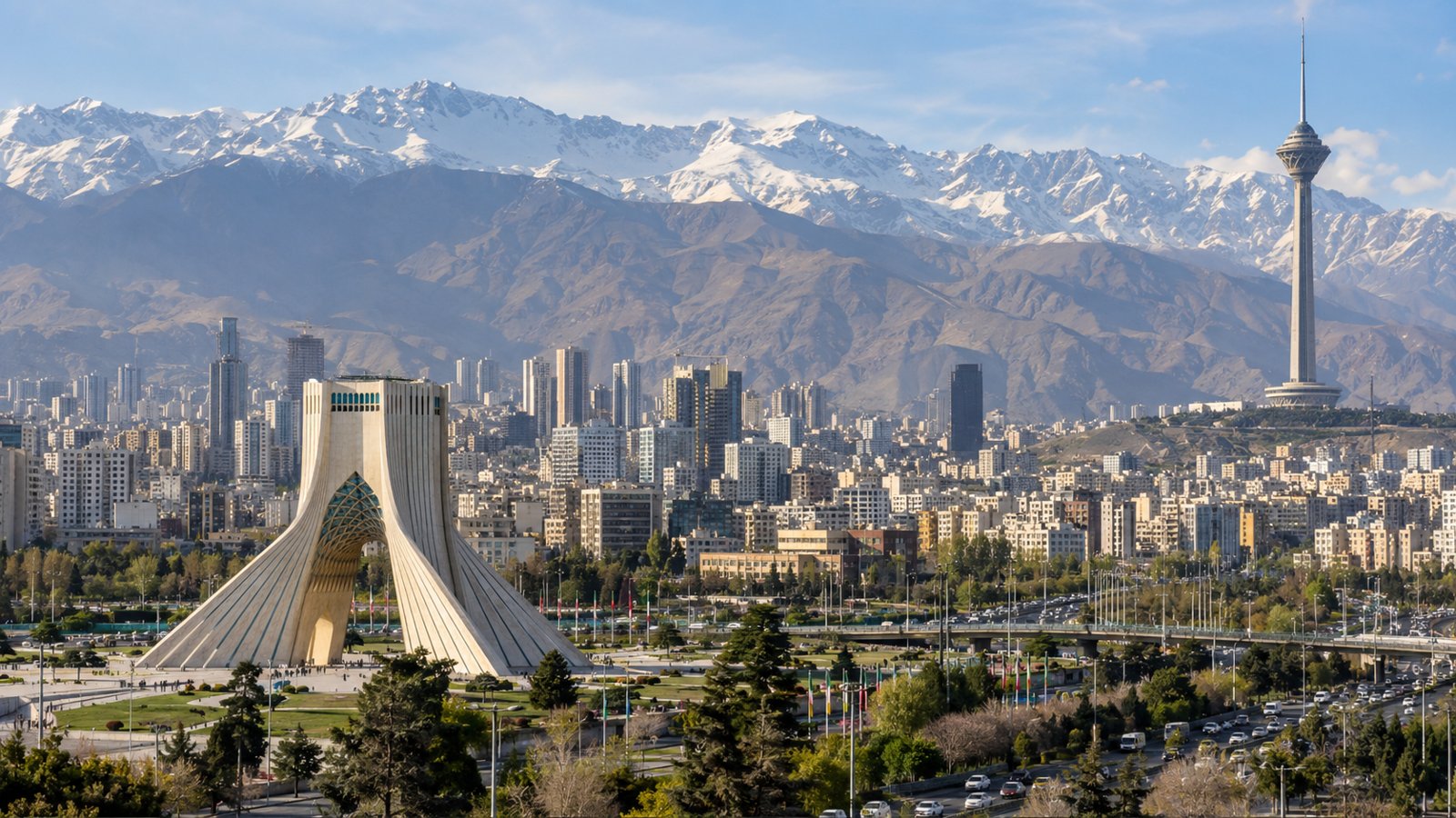 Tehran, Iran city skyline with urban buildings and mountains in the background. / نمای شهری تهران، ایران با ساختمان‌های شهری و کوهستان در پس‌زمینه.